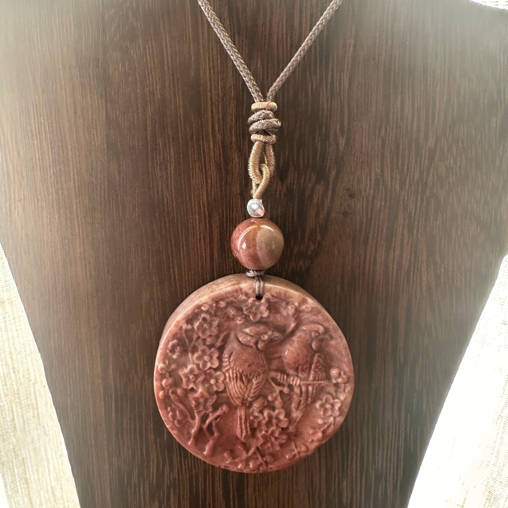 Coral Fossil Carved Round Bird Pendant Necklace on Tan Adjustable Rope - Picture 9 of 13